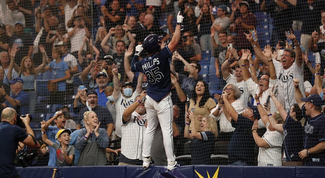 Brett Phillips of the Tampa Bay Rays celebrates after hitting a