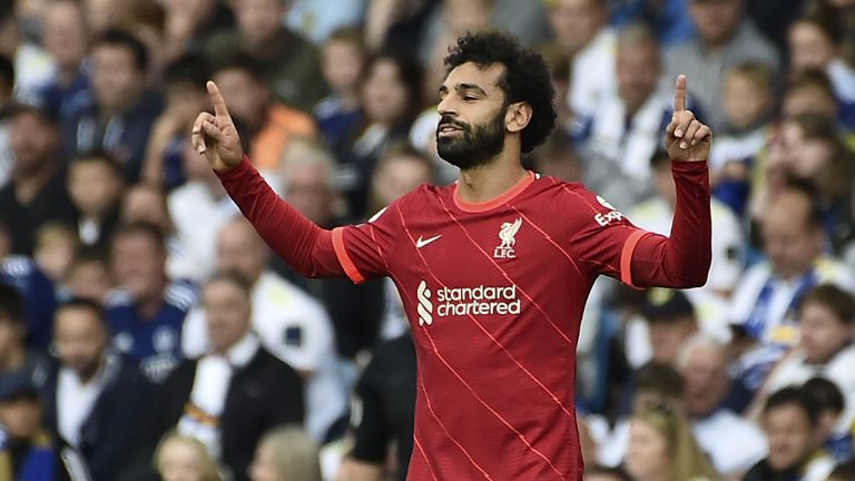 Liverpool's Mohamed Salah celebrates after scoring the opening goal during the English Premier League soccer match between Leeds United and Liverpool at Elland Road, Leeds, England, Sunday, Sept. 12, 2021. (Rui Vieira/AP)