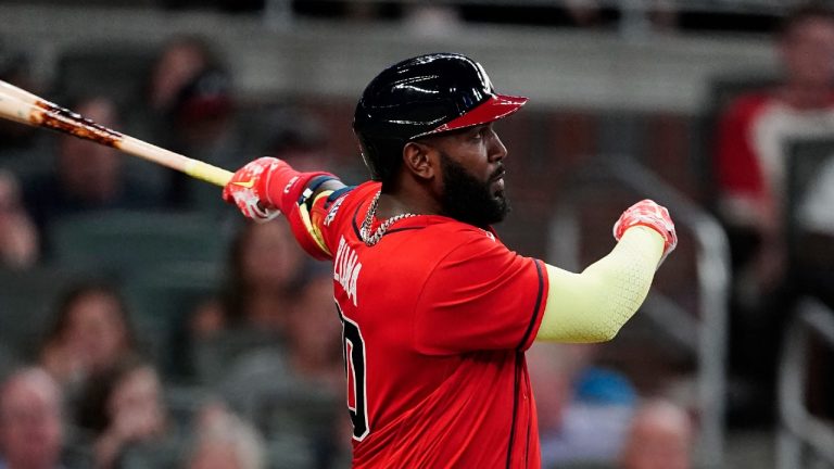 Atlanta Braves' Marcell Ozuna (20) follows through on a solo home run during the sixth inning of the team's baseball game against the Pittsburgh Pirates on Friday, May 21, 2021, in Atlanta (John Bazemore/AP).
