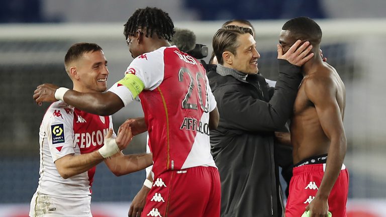 Monaco's head coach Niko Kovac, second right, congratulates his players. (Francois Mori/AP)