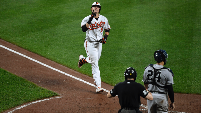 Baltimore Orioles' Ryan Mountcastle points skyward after hitting a solo home run against the New York Yankees during the sixth inning of a baseball game Thursday, Sept. 16, 2021, in Baltimore. (Gail Burton / AP) 