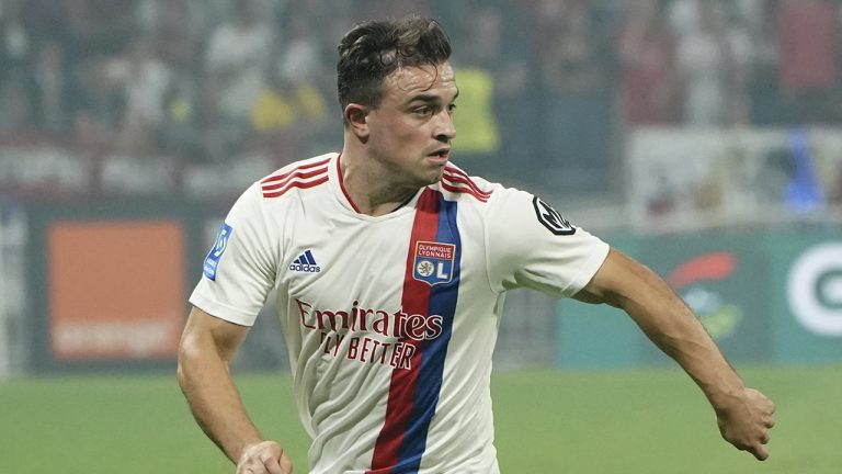 Lyon's Xherdan Shaqiri controls the ball during the French League One soccer match between Strasbourg RCSA and Olympique Lyonnais at the Groupama stadium in Lyon, France, Sunday, Sept. 12, 2021. (Laurent Cipriani/AP)