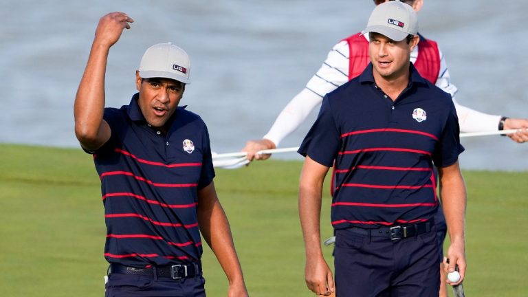 Team USA's Tony Finau reacts after making a putt on the 13th hole during a four-ball match the Ryder Cup at the Whistling Straits Golf Course Friday, Sept. 24, 2021, in Sheboygan, Wis (Jeff Roberson/AP).