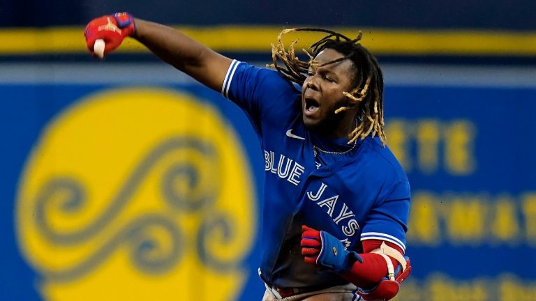 Toronto Blue Jays' Vladimir Guerrero Jr. reacts to his single off Tampa Bay Rays relief pitcher Nick Anderson during the sixth inning of a baseball game Tuesday, Sept. 21, 2021, in St. Petersburg, Fla. Guerrero Jr., to second on a throw to third base (Chris O'Meara/AP).