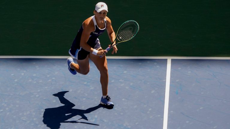 Ashleigh Barty, of Australia, returns a shot to Clara Tauson, of Denmark, during the second round of the US Open tennis championships, Thursday, Sept. 2, 2021, in New York. (Elise Amendola/AP)