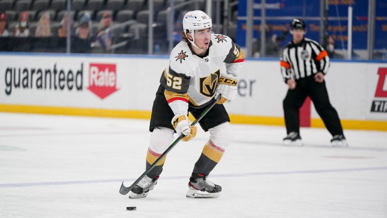 Vegas Golden Knights' Dylan Coghlan controls the puck during the third period of an NHL hockey game against the St. Louis Blues. (Jeff Roberson/AP)