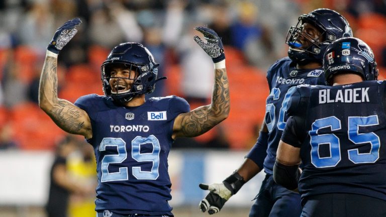 Toronto Argonauts running back D.J. Foster (29) celebrates after scoring a touchdown during first half CFL football action against the Montreal Alouettes in Toronto, Friday, Sept. 24, 2021. (Cole Burston/CP)