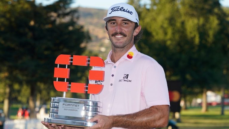 Max Homa poses with his trophy on the 18th green of the Silverado Resort North Course after winning the Fortinet Championship PGA golf tournament Sunday, Sept. 19, 2021, in Napa, Calif. (Eric Risberg/AP)