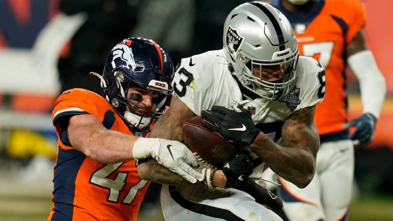 Denver Broncos inside linebacker Josey Jewell (47) tackles Las Vegas Raiders tight end Darren Waller (83) during the second half of an NFL football game, Sunday, Jan. 3, 2021, in Denver. (Jack Dempsey/AP)