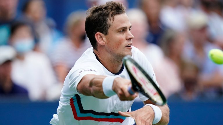 Vasek Pospisil, of Canada, strikes the ball during the first round of the US Open tennis championships, Tuesday, Aug. 31, 2021, in New York. (Frank Franklin II/AP)