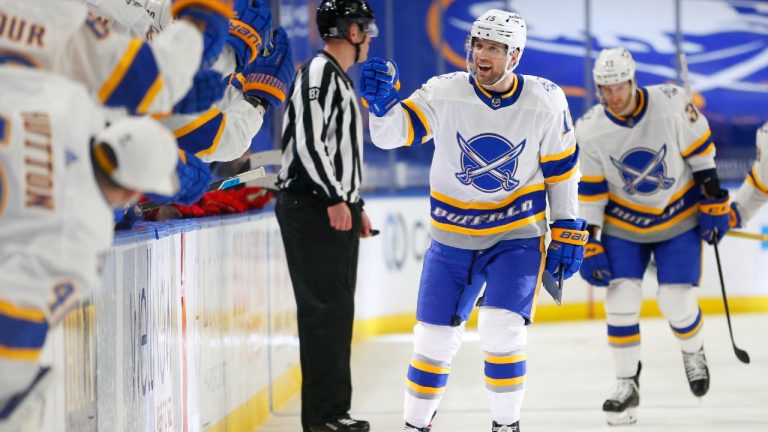 Buffalo Sabres forward Riley Sheahan (15) celebrates his goal during the first period of the team's NHL hockey game against the New Jersey Devils, Thursday, Feb. 25, 2021, in Buffalo, N.Y. (Jeffrey T. Barnes/AP)