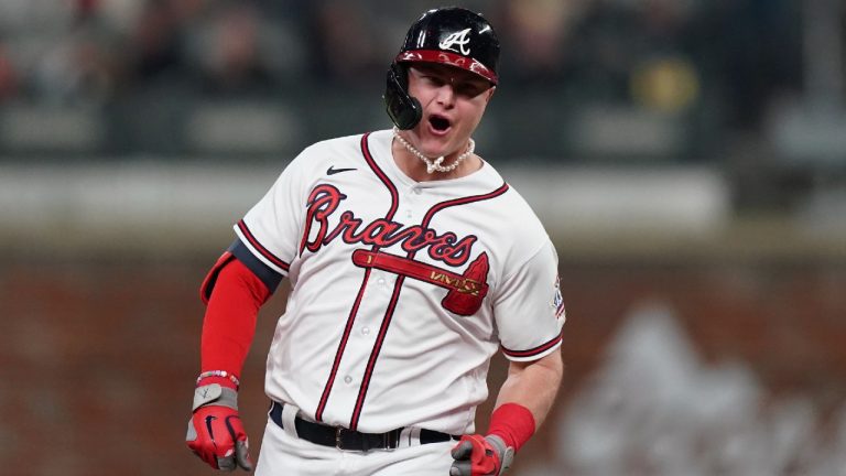 Atlanta Braves' Joc Pederson celebrates after hitting a two-run home run during the fourth inning in Game 2 of baseball's National League Championship Series against the Los Angeles Dodgers Sunday, Oct. 17, 2021, in Atlanta. (Brynn Anderson/AP)