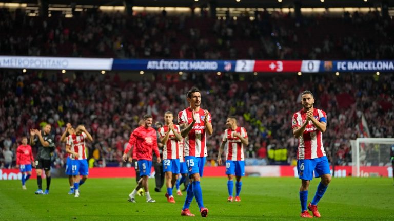 Atletico Madrid players greet the crowd after the La Liga soccer match between Atletico Madrid and Barcelona at the Estadio Wanda Metropolitano in Madrid, Saturday, Oct. 2, 2021. Atletico won the match 2-0 (Manu Fernandez/AP).