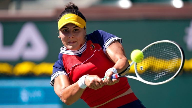 Bianca Andreescu returns to Anett Kontaveit at the BNP Paribas Open. (Mark J. Terrill/AP)