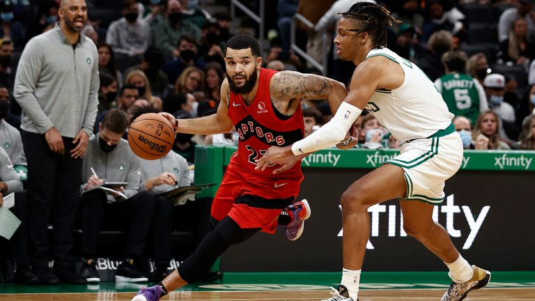Toronto Raptors' Fred VanVleet, front left, drives against Boston Celtics' Romeo Langford, right, during the second half of an NBA preseason basketball game Saturday, Oct. 9, 2021, in Boston. (Winslow Townson/AP)