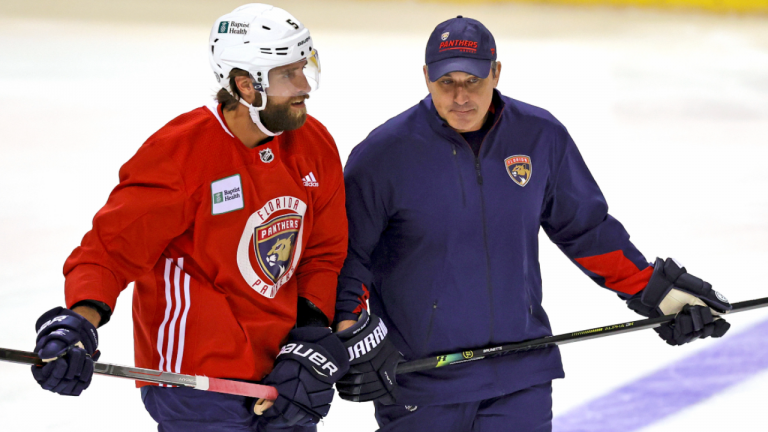 Panthers head coach Andrew Brunette, right, seen here with Aaron Ekblad during training camp. (AP)