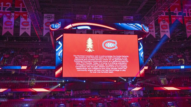 The scoreboard shows a message to accompany the Indigenous land acknowledgement before the Montreal Canadiens and San Jose Sharks hockey game. (Ryan Remiorz/CP)