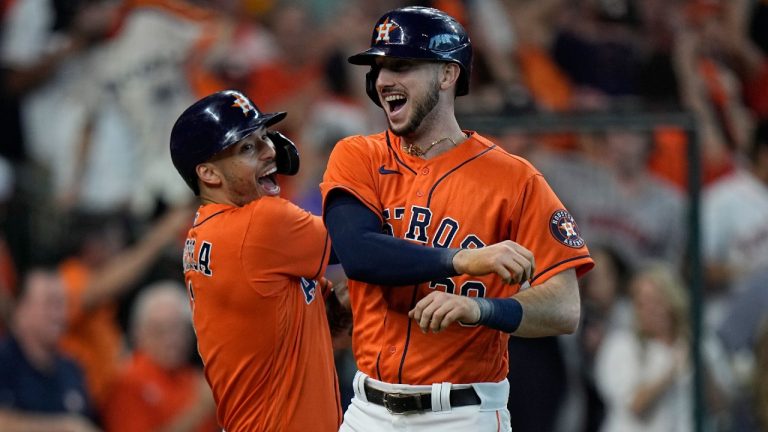Houston Astros' Kyle Tucker, right, celebrates his two-run homer against the Chicago White Sox with teammate Carlos Correa (1) during the seventh inning in Game 2 of a baseball American League Division Series Friday, Oct. 8, 2021, in Houston (David J. Philip/AP).