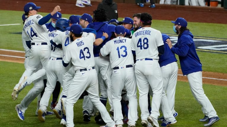Los Angeles Dodgers celebrate after defeating the Tampa Bay Rays 3-1 to win the baseball World Series in Game 6 Tuesday, Oct. 27, 2020, in Arlington, Texas. (Tony Gutierrez/AP)