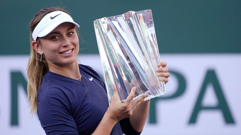 Paula Badosa, of Spain, holds up her trophy after defeating Victoria Azarenka, of Belarus, in the singles final at the BNP Paribas Open tennis tournament Sunday, Oct. 17, 2021, in Indian Wells, Calif. (Mark J. Terrill/AP)