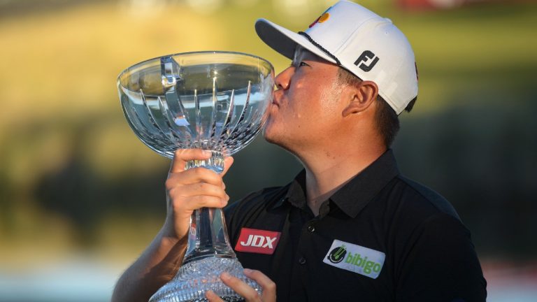 Sungjae Im celebrates his victory in the Shriners Children's Open Sunday, Oct. 10, 2021, at TPC Summerlin in Las Vegas. Im carded a 24-under-par to win by four strokes (Sam Morris/AP).