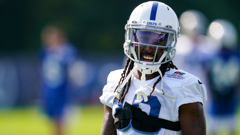 Indianapolis Colts wide receiver T.Y. Hilton (13) smiles as he joins a drill during practice at the NFL team's football training camp in Westfield, Ind., Monday, Aug. 23, 2021 (Michael Conroy/AP).
