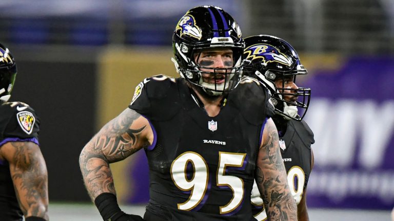 Baltimore Ravens defensive end Derek Wolfe (95) looks on during the first half of an NFL football game against the Dallas Cowboys. (Terrance Williams/AP)