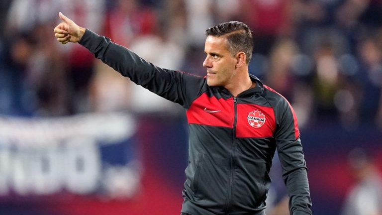Canada head coach John Herdman salutes the crowd as he leaves the pitch following a 1-1 draw against the United States in a World Cup soccer qualifier Sunday, Sept. 5, 2021, in Nashville, Tenn. (Mark Humphrey/AP Photo) 

