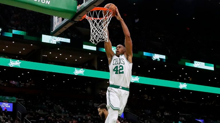 Boston Celtics' Al Horford goes in for a dunk during the second quarter of an NBA pre-season basketball game Saturday, Oct. 9, 2021, in Boston. (Winslow Townson/AP)