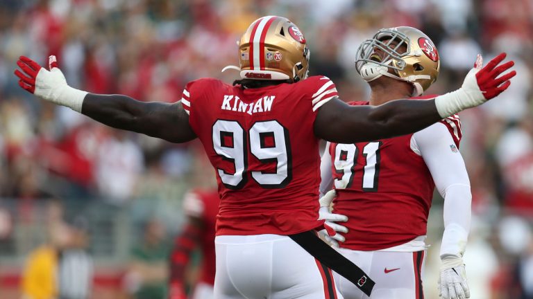 San Francisco 49ers defensive end Arik Armstead (91) celebrates after sacking Green Bay Packers quarterback Aaron Rodgers with defensive tackle Javon Kinlaw (99) during the first half of an NFL football game. (Jed Jacobsohn/AP) 