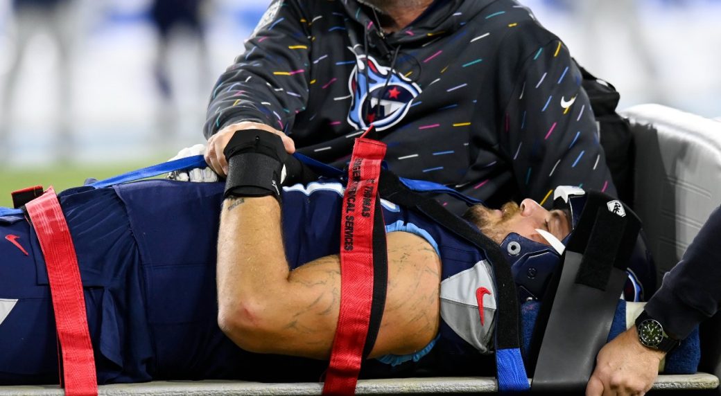 Titans left tackle Taylor Lewan carted off field with injury