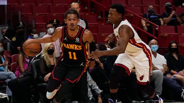Miami Heat guard Kyle Lowry (7) defends against Atlanta Hawks guard Trae Young (11) during the first half of a pre-season NBA basketball game, Monday, Oct. 4, 2021, in Miami. (Marta Lavandier/AP)