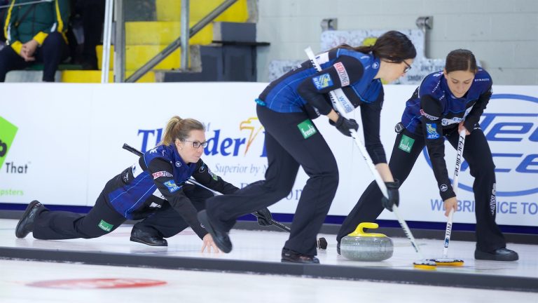 Krista McCarville (left) watches her stone as Ashley Sippala (centre) and Sarah Potts (right) sweep during the 2018 Tour Challenge in Thunder Bay, Ont. (Anil Mungal)