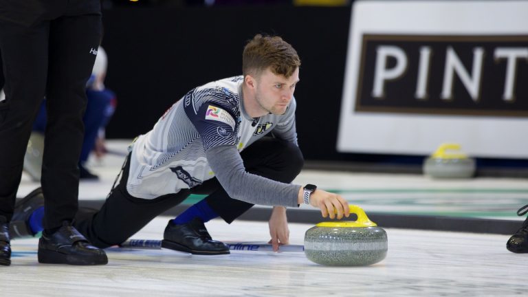 Bruce Mouat shoots a stone during the 2019 Masters in North Bay, Ont. (Anil Mungal)