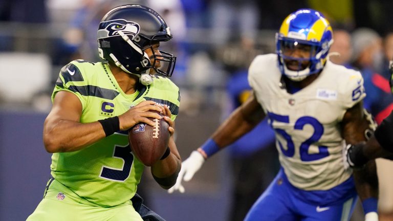 Seattle Seahawks quarterback Russell Wilson (3) passes against the Los Angeles Rams during the first half of an NFL football game. (Elaine Thompson/AP) 