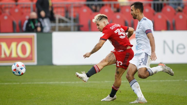 Toronto FC midfielder Yeferson Soteldo (30) scores a goal against the Chicago Fire during second half MLS soccer action in Toronto, Sunday, Oct. 3, 2021. (Cole Burston/CP)