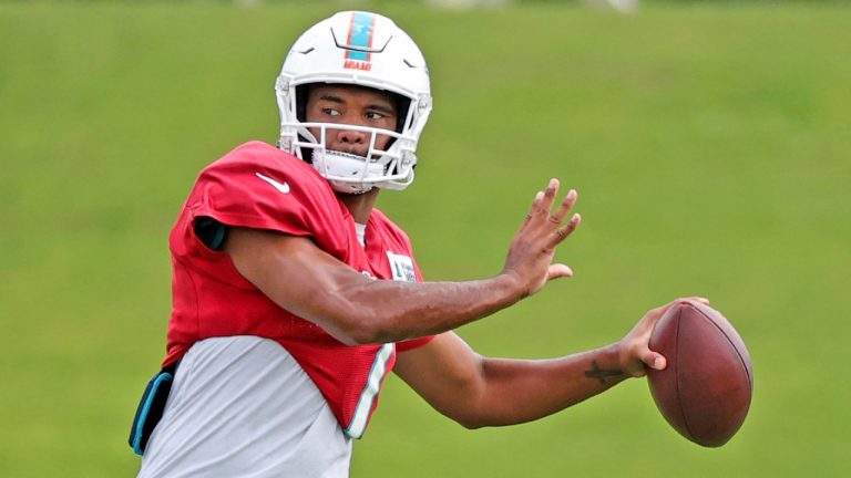 Miami Dolphins quarterback Tua Tagovailoa (1) sets up to pass during NFL football practice in Miami Gardens Fla., Wednesday, Oct. 13, 2021. The Dolphins play against the Jacksonville Jaguars in London on Sunday. (David Santiago/Miami Herald via AP)