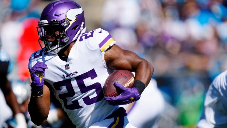 Minnesota Vikings running back Alexander Mattison (25) runs against the Carolina Panthers during the first half of an NFL football game, Sunday, Oct. 17, 2021, in Charlotte, N.C. (Jacob Kupferman/AP) 