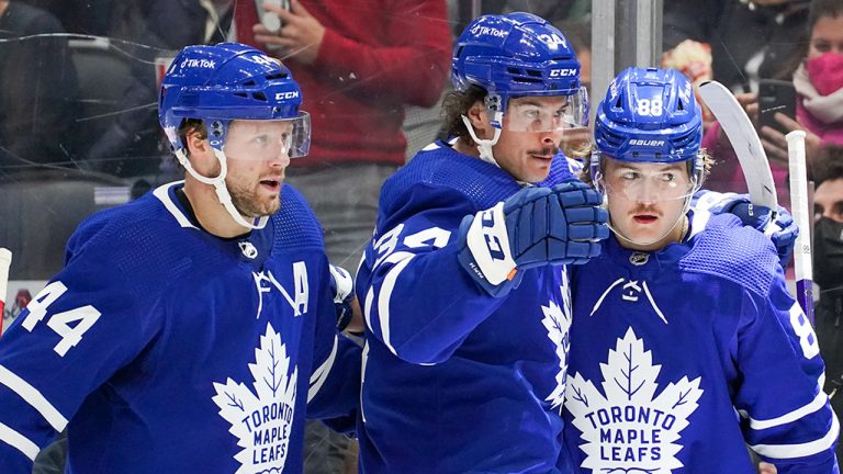 Toronto Maple Leafs Morgan Rielly (44), Auston Matthews (34) and William Nylander (88) celebrate a goal against the Vegas Golden Knights. (Evan Buhler/CP) 