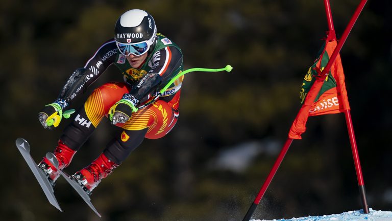 Brodie Seger, of Canada, hammers a gate in the men's World Cup Super-G ski race in Lake Louise, Alta. (Frank Gunn/THE CANADIAN PRESS)