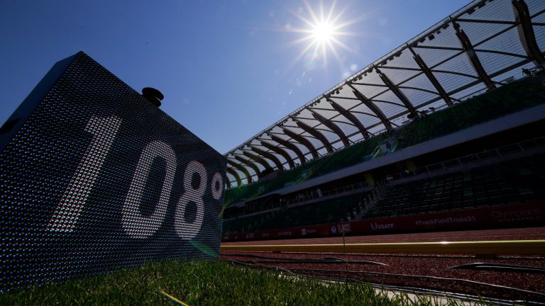 A sign displaying the current temperature is shown after events were postponed due to high heat at the U.S. Olympic Track and Field Trials Sunday, June 27, 2021, in Eugene, Ore. (Charlie Riedel/AP Photo)