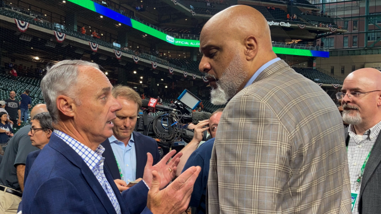 Commissioner Rob Manfred. left, and MLBPA executive director Tony Clark, seen here before Game 1 of the World Series, might be talking a lot in the coming days in order to prevent a work stoppage. (AP/file)