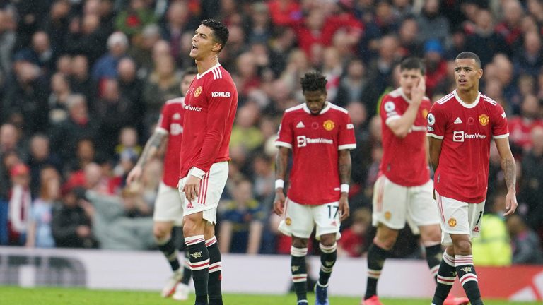 Manchester United's Cristiano Ronaldo, left, reacts with his teammates after Manchester City's Bernardo Silva scored his side's second goal during the English Premier League soccer match between Manchester United and Manchester City at Old Trafford stadium in Manchester, England, Saturday, Nov. 6, 2021. (Jon Super/AP)