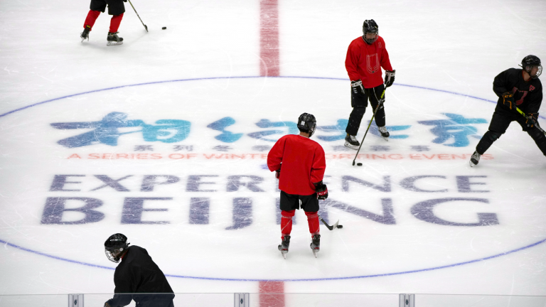 The China Ice Sports College hockey team works out at a test event for the 2022 Beijing Winter Olympics, at the National Indoor Stadium in Beijing. (AP)