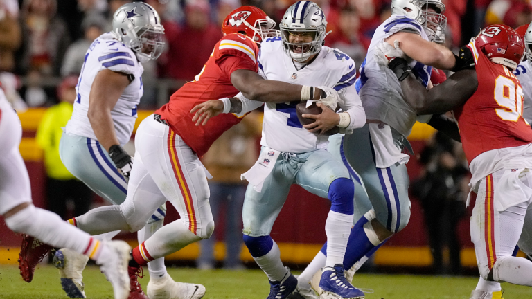 Dallas Cowboys quarterback Dak Prescott (4) is sacked by Kansas City Chiefs defensive tackle Chris Jones during the second half of an NFL football game Sunday, Nov. 21, 2021, in Kansas City, Mo. (AP Photo/Charlie Riedel)