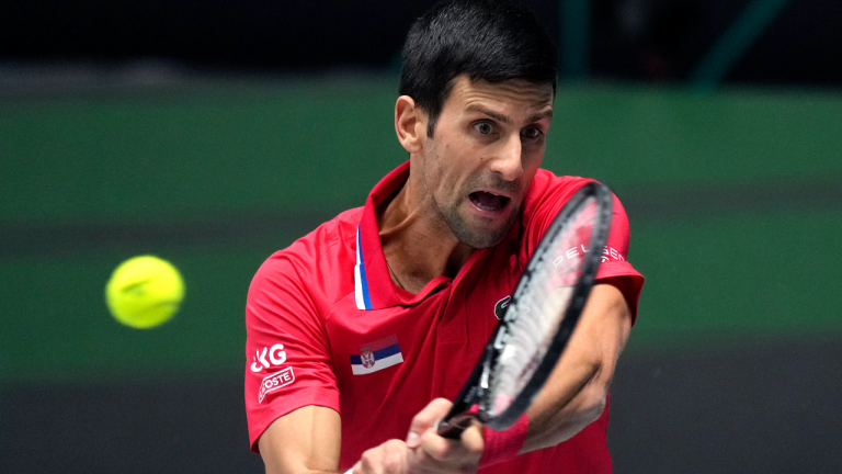 Serbia's Novak Djokovic hits a backhand against Germany's Jan-Lennard Struff during a Davis Cup group F match between Serbia and Germany in Innsbruck, Austria, Saturday. (Photo/Michael Probst)
