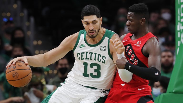 Boston Celtics' Enes Kanter (13) moves against Toronto Raptors' Isaac Bonga. (Michael Dwyer/AP)