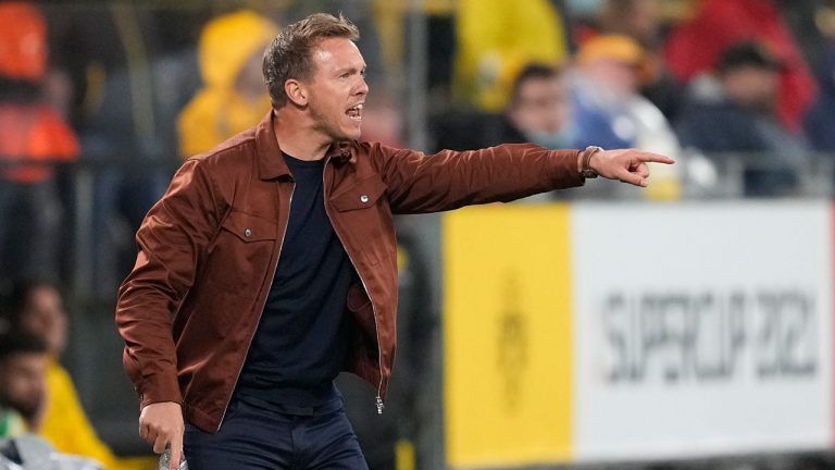 Bayern's head coach Julian Nagelsmann gives instructions from the side line during the German Supercup soccer match between Borussia Dortmund and Bayern Munich. (Martin Meissner/AP)
