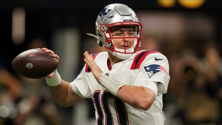 New England Patriots quarterback Mac Jones (10) works against the Atlanta Falcons during the first half of an NFL football game, Thursday, Nov. 18, 2021, in Atlanta (Brynn Anderson/AP).