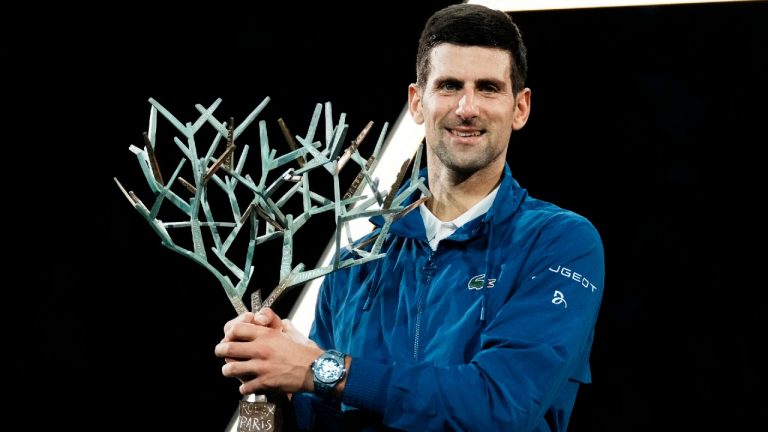 Serbia's Novak Djokovic holds his trophy after defeating Russia's Daniil Medvedev in the final match of the Paris Masters tennis tournament at the Accor Arena in Paris, Sunday, Nov.7, 2021. Djokovic won 4-6, 6-3, 6-3. (Thibault Camus/AP)